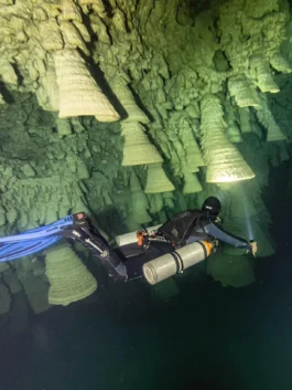 Diver following a guideline during TDI Cavern Diver Course training.